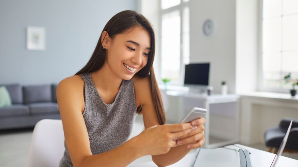 a woman working with her cell phone